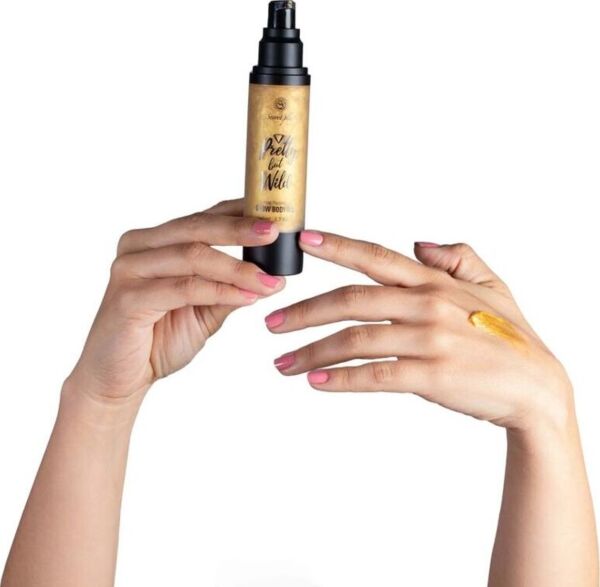 Flaconul uleiului corporal iluminator Glow Body Oil Pretty But Wild de la Secret Play